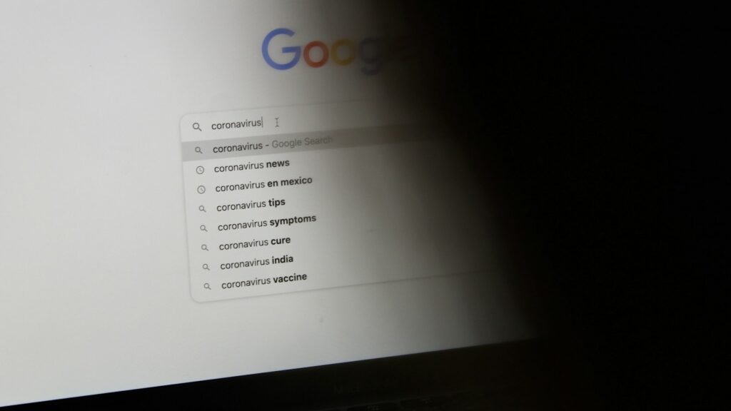 Google Search Console guide: laptop displaying Google search