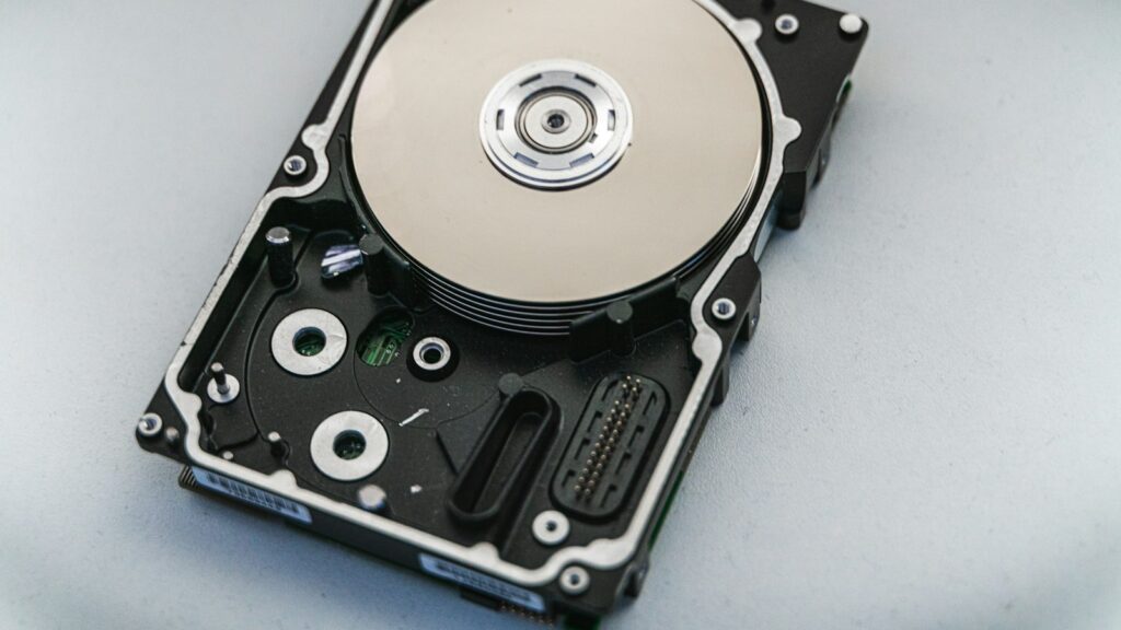 Silver and black hard disk drive