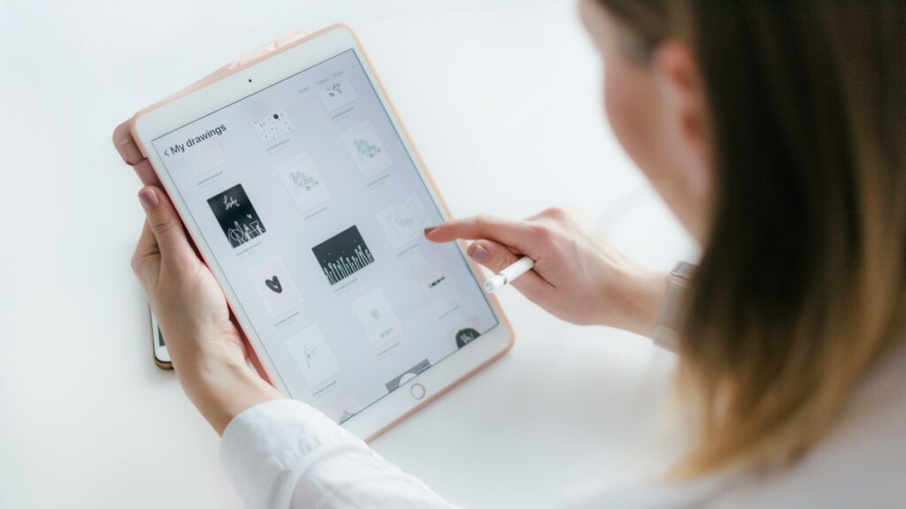 Woman using gold iPad