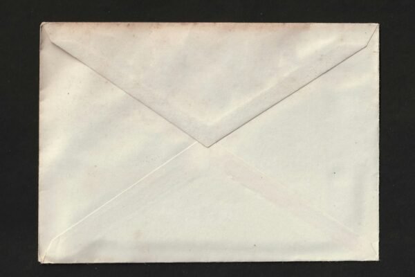 A white envelope on a black background