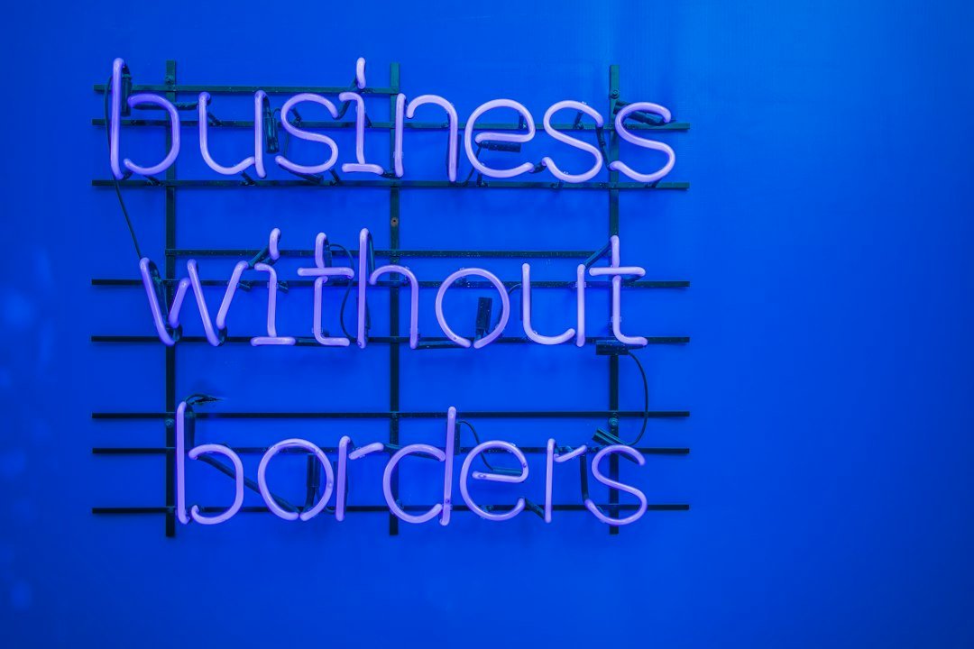 Why Your Business Needs A Digital Partner, Not Just A Website In 2026 2 A Neon Sign That Says Business Without Borders