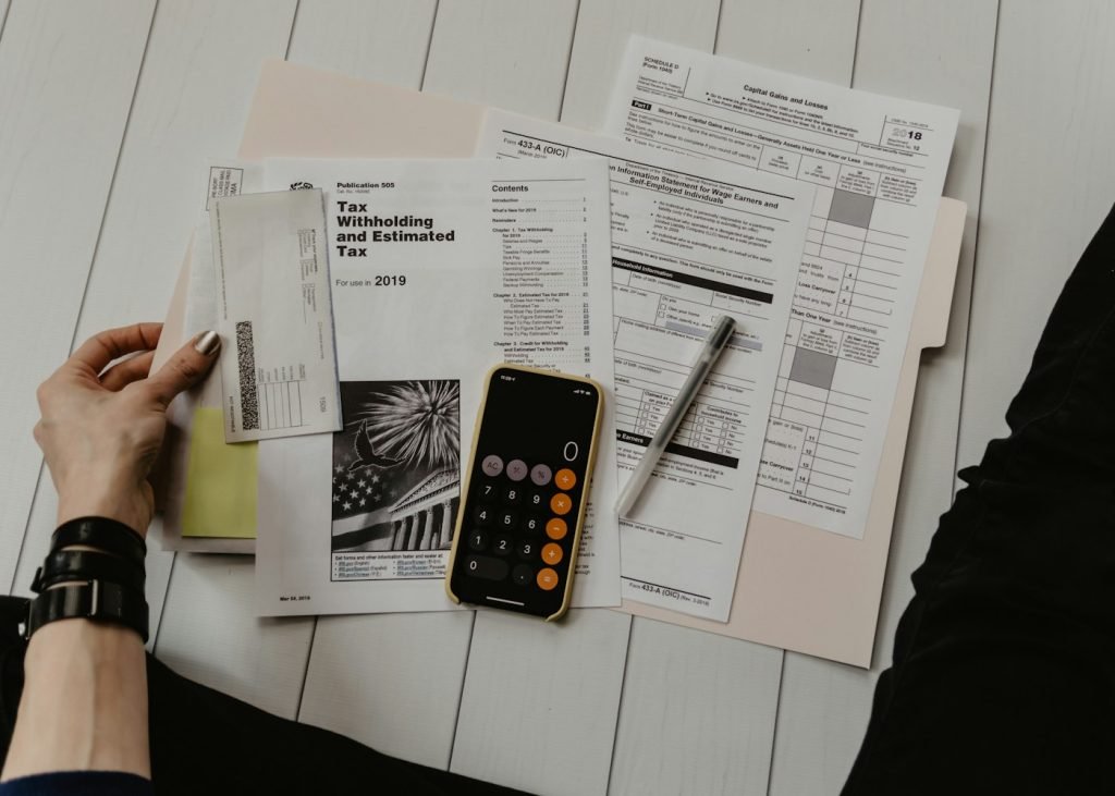 Invoices and accounting figures being reviewed