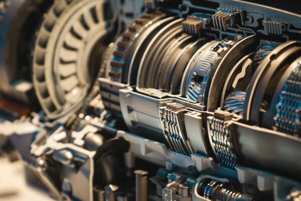 Cutaway view of the gears inside a gearbox, like the moving parts of custom automation