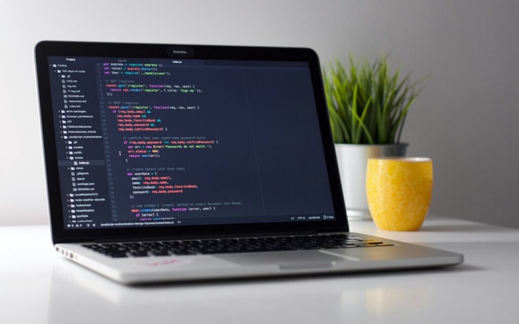 Code on a laptop screen during an integration build
