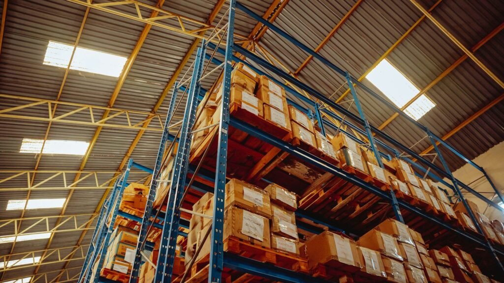 Labelled boxes on tall warehouse racking, like stored records awaiting a GDPR data migration