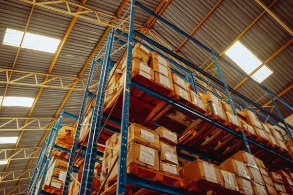 Labelled boxes on tall warehouse racking, like stored records awaiting a GDPR data migration