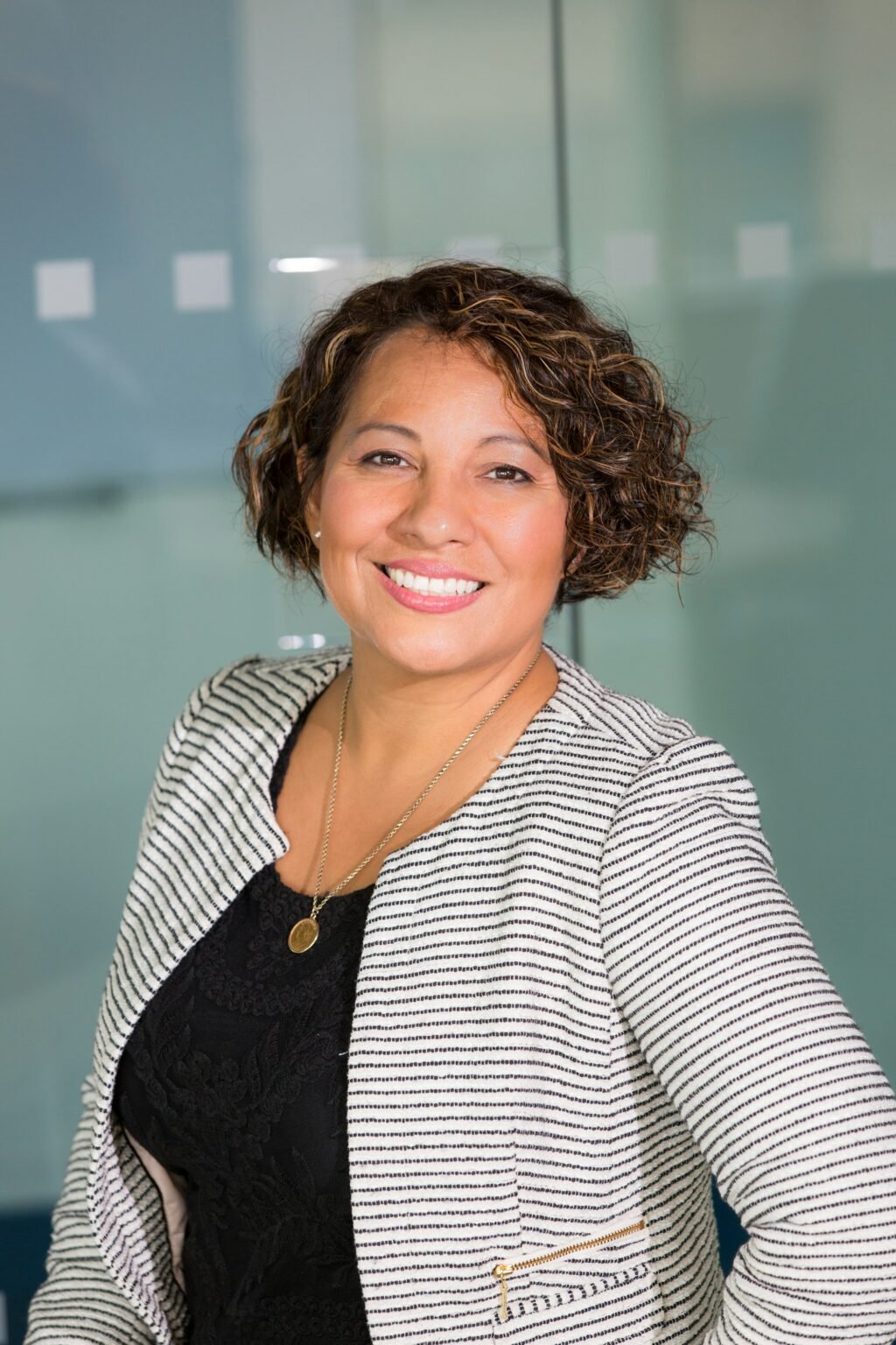 A smiling member of the Extra Web Solutions team